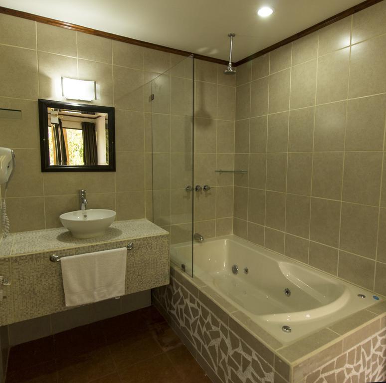 Copacabana Hotel And Suites (Adults Only) Jaco Room photo